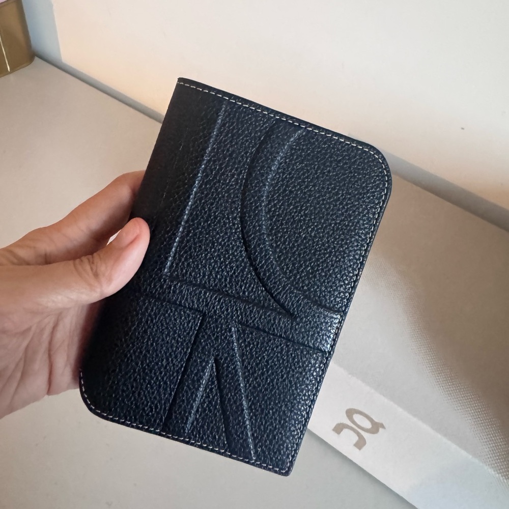 Toteme Monogram leather passport holder in black grain
